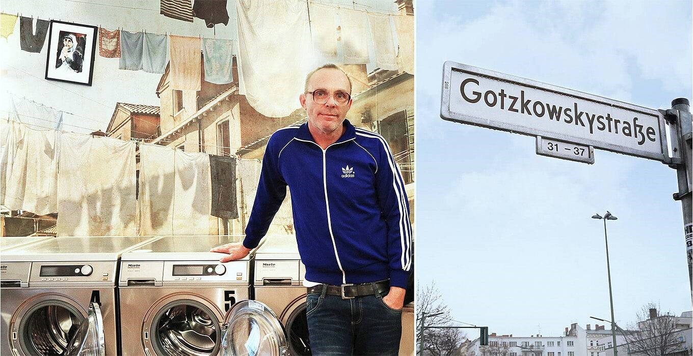 Mann steht in Berliner Waschsalon